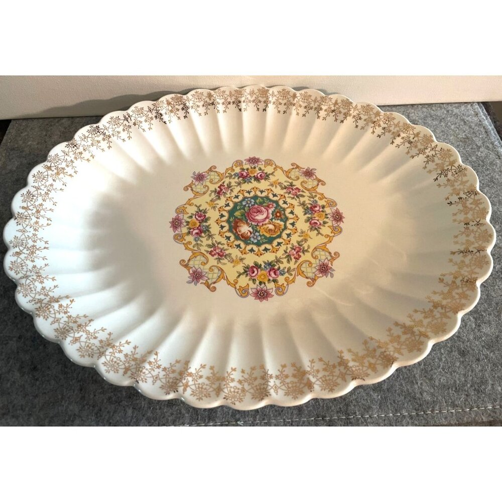 Vintage oval Plate by American Home Pattern Melody Warranted 22-k Accented  11 i